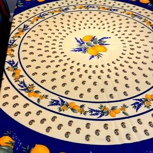 70”round tablecloth yellow background w/lemons and lavender med blue around edge